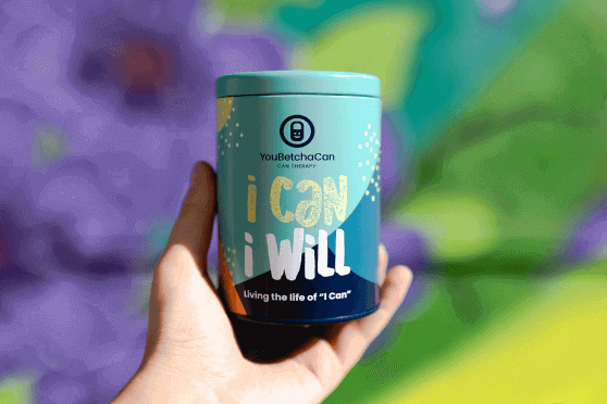 A tin can called Youbetchacan as a motivational tool to write the things you cant do and turn them into possibilities. 